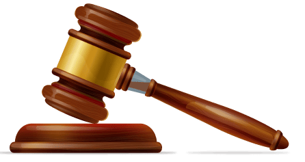 Marteau de juge en bois sur un socle.